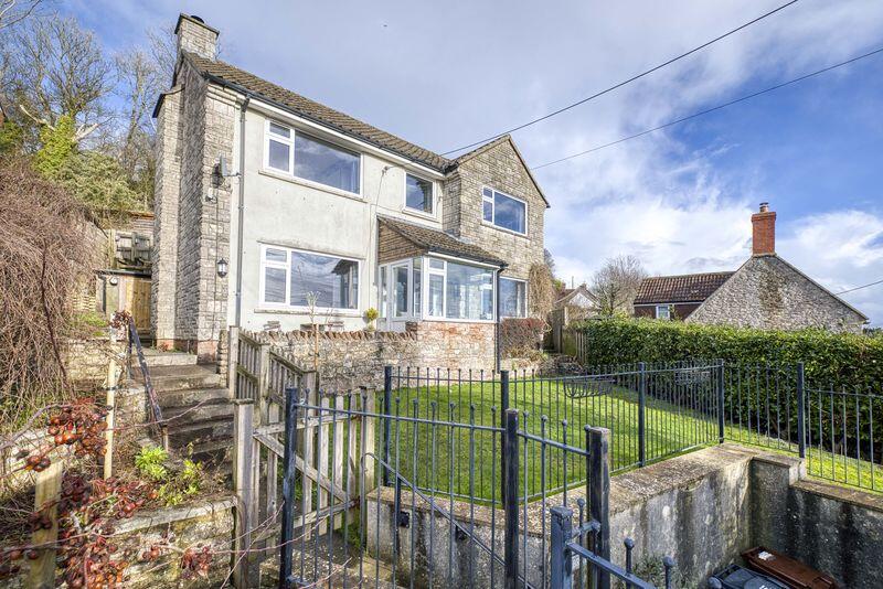 Elevated detached village home in West Horrington enjoying open views across Wells 