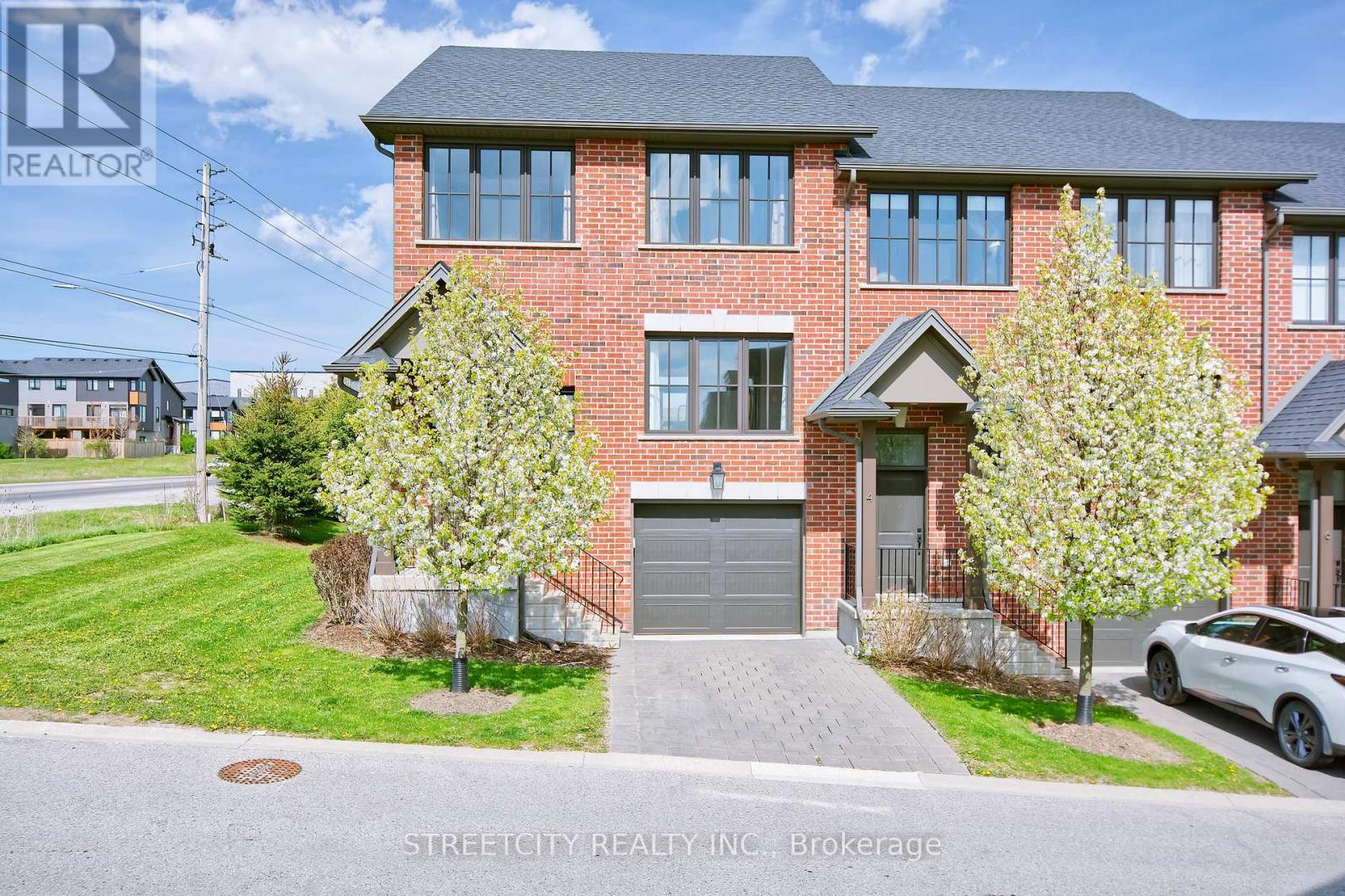 2 - 555 SUNNINGDALE ROAD E