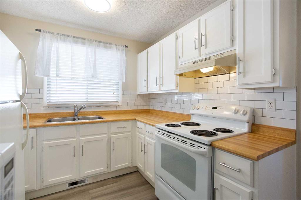 Additional image 5 of 1144 Berkley Drive NW, Calgary, AB, T3K 1E4