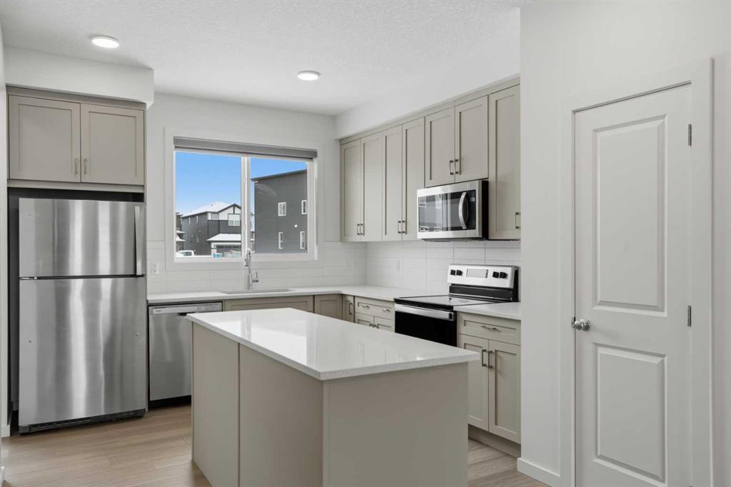 Additional image 3 of 49 Belmont Drive SW, Calgary, AB, T2X 4Z6