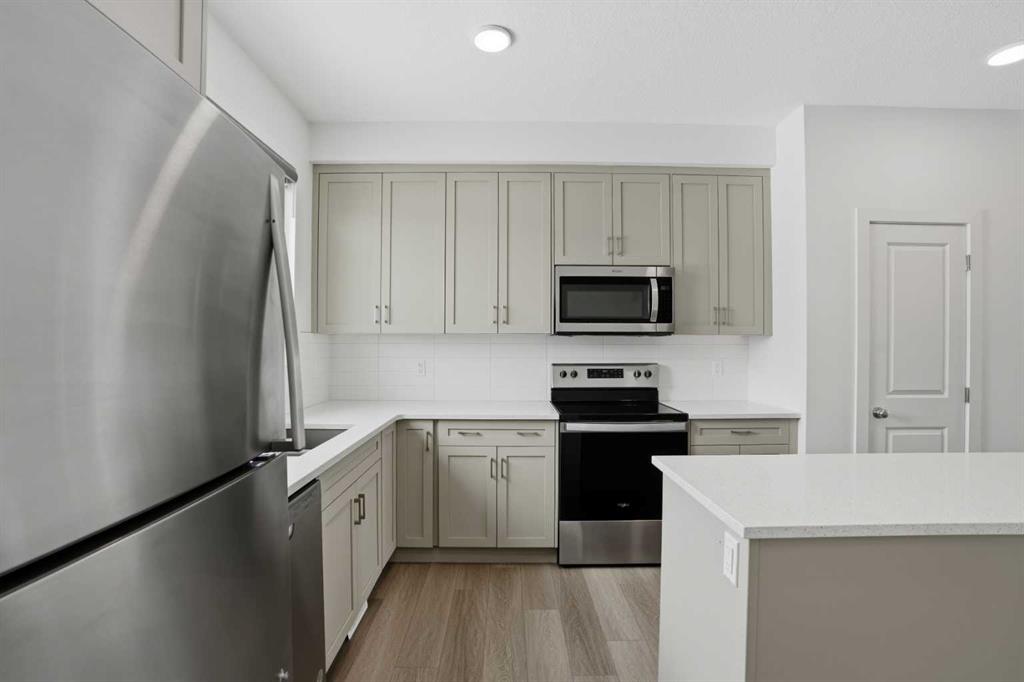 Additional image 4 of 49 Belmont Drive SW, Calgary, AB, T2X 4Z6