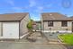 'A two double bedroom detached property with an 18' garage'