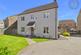 '1555 sq. ft. executive detached family home with gated driveway'