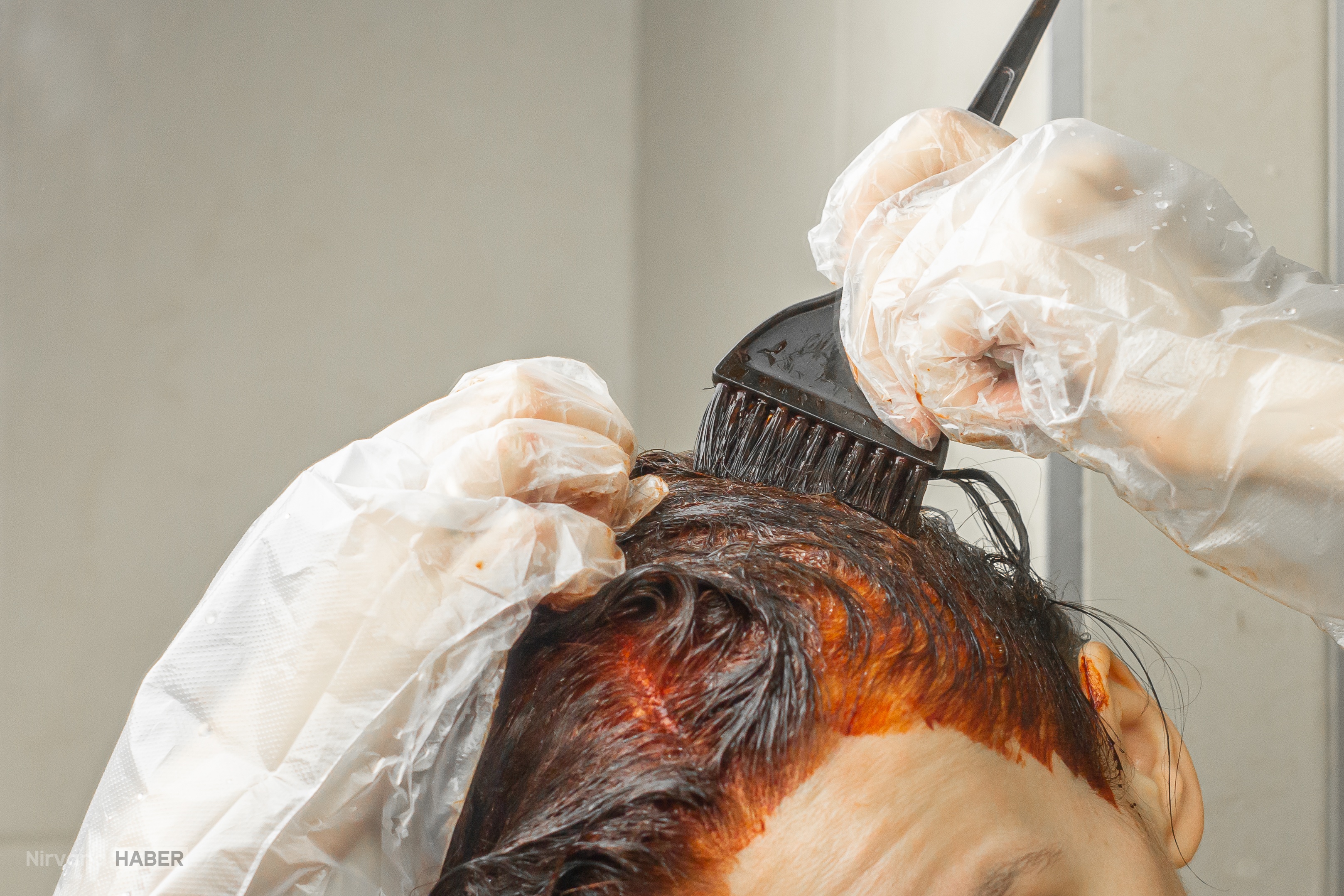process-of-hair-dyeing-in-red-colour-using-a-brush-2026-01-09-06-40-07-utc.jpg
