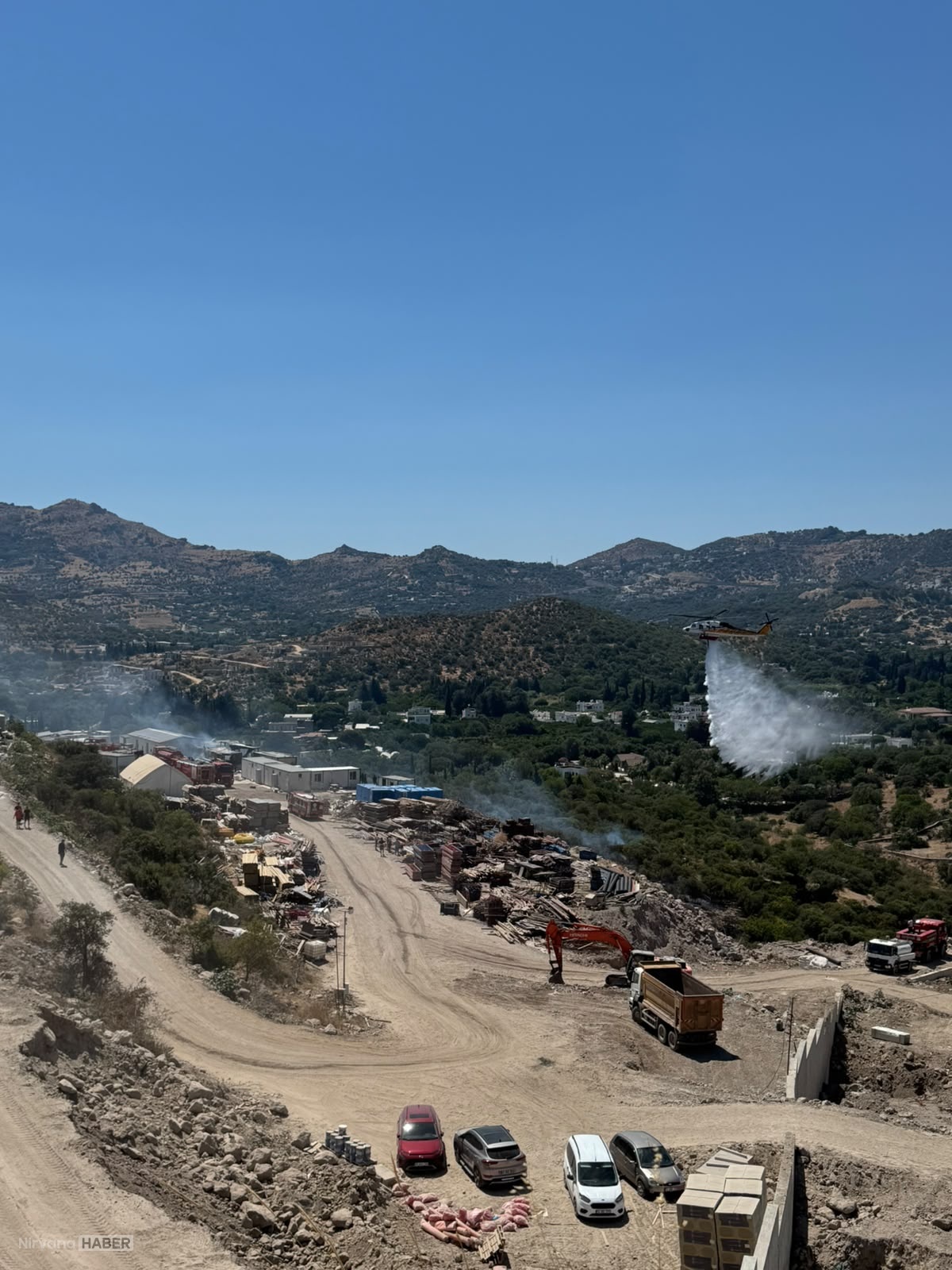 AA-20260712-41958486-41958483-BODRUMDA_KONTEYNERDE_BASLAYIP_MAKILIK_ALANA_SICRAYAN_YANGIN_SONDURULDU.jpg