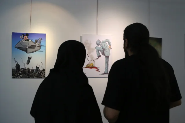 Tahran'da 'Suç Senfonisi' Karikatür Sergisi Açıldı
