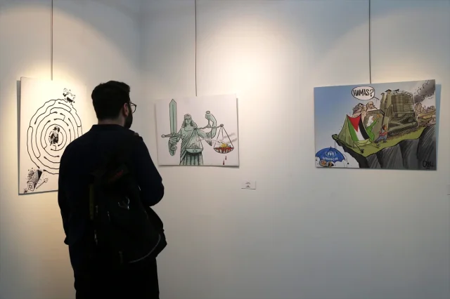 Tahran'da 'Suç Senfonisi' Karikatür Sergisi Açıldı