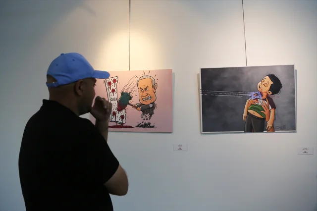 Tahran'da 'Suç Senfonisi' Karikatür Sergisi Açıldı
