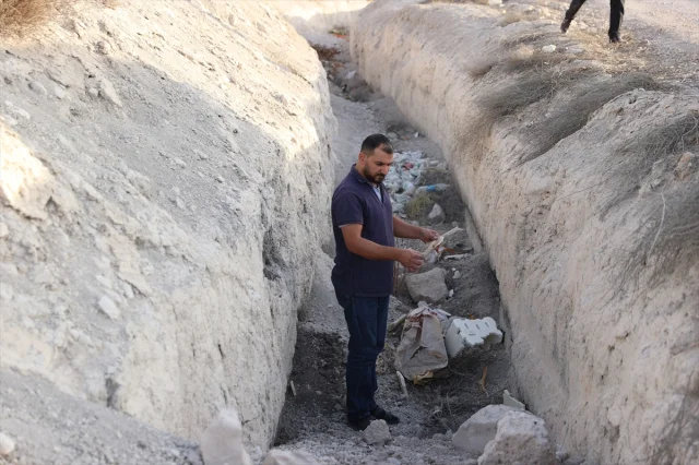 Suriye'de Duma Kırsalında Korkutan Keşif: Toplu Mezar Bulundu