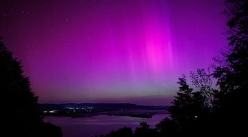 Асимметрия магнитосферы: от Сатурна до земных штормов над Россией