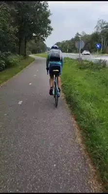 WH. cycling from office with Nicander