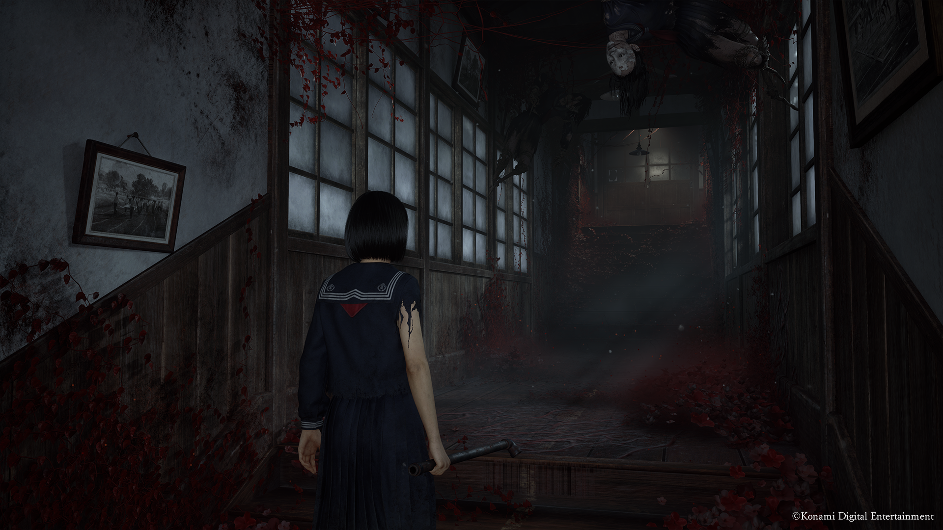As Hinako explores a school in Silent Hill f, an enemy lurks in the ceiling.