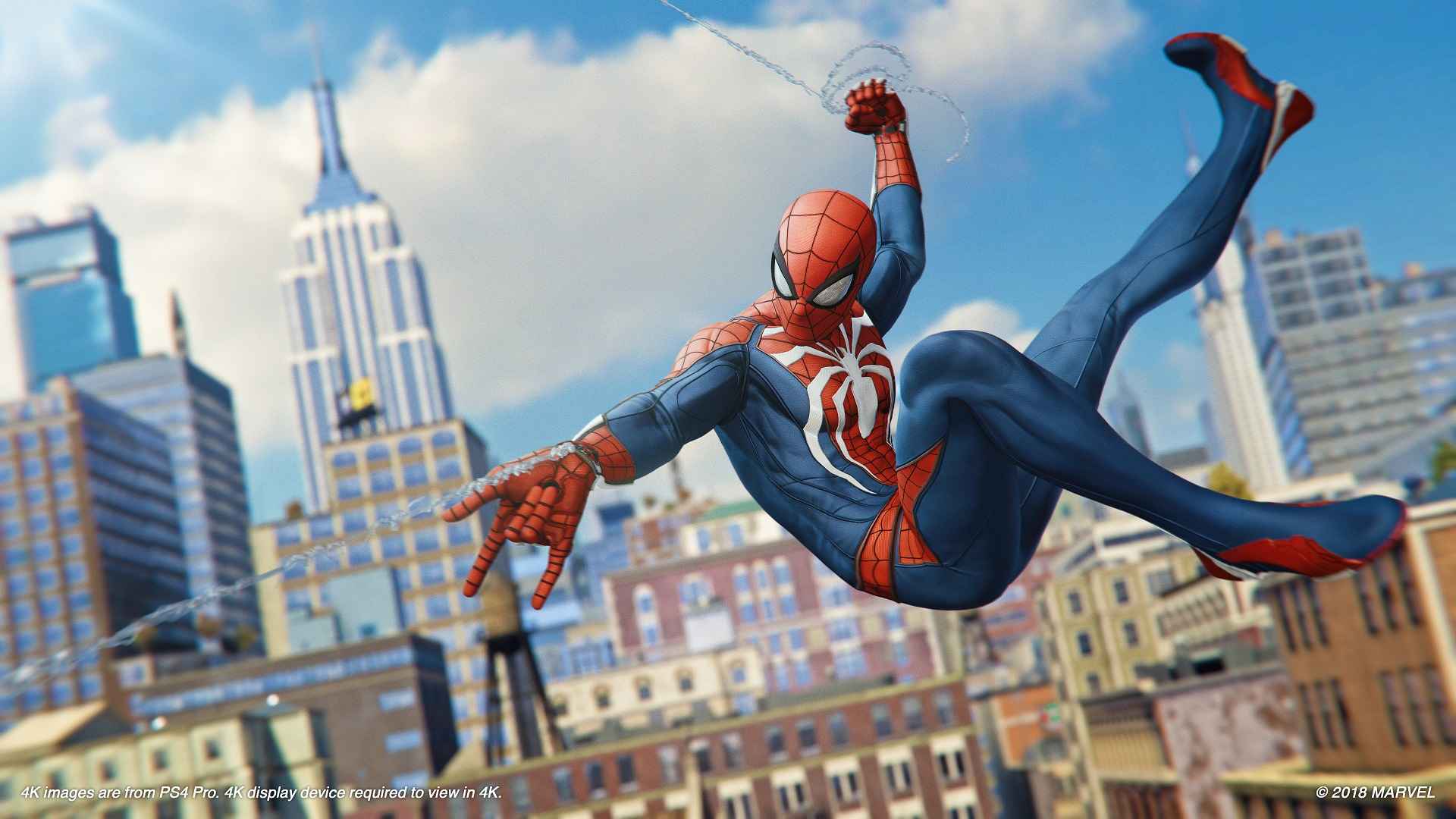 Spider-Man swings through the streets.
