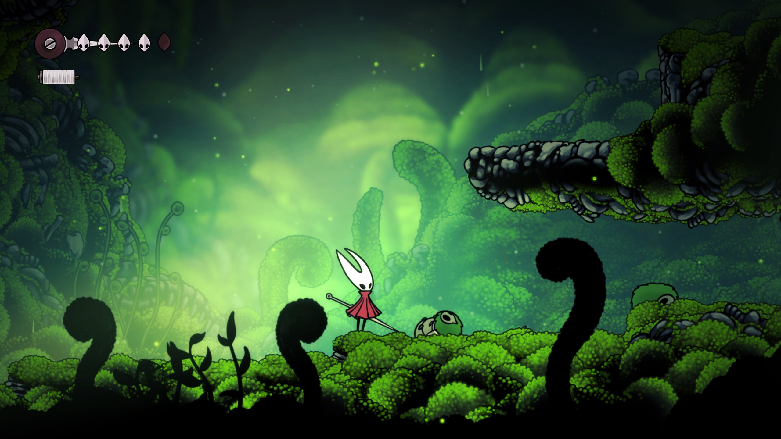 Jump up the ledges just before the moss field with the two feeding grubs(Image credit: Team Cherry)