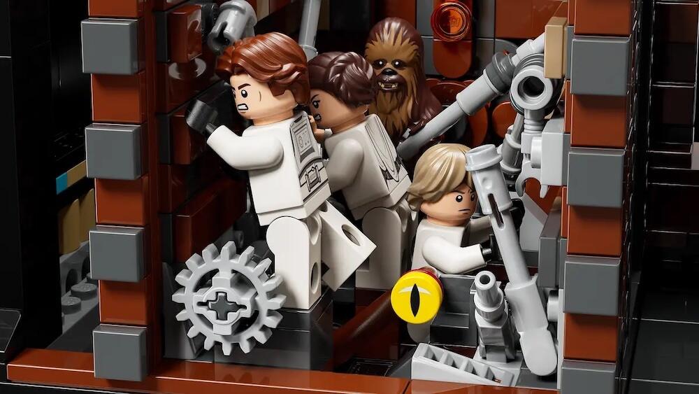 Luke Skywalker, Princess Leia, Han Solo, and Chewbacca escape the trash compactor.