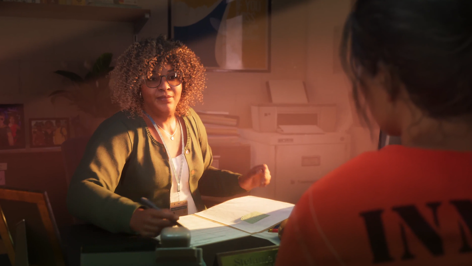 We see even more of this detail as the shot switches to show Stefanie, a member of staff at the Leonida Department of Correction. We can see the name of the facility printed across her lanyard, as well as the initials LDC on Lucia’s prison uniform.