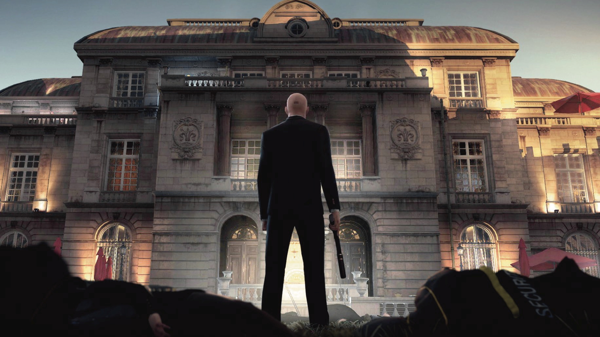 Agent 47 stands above corpses in Paris in Hitman 2016
