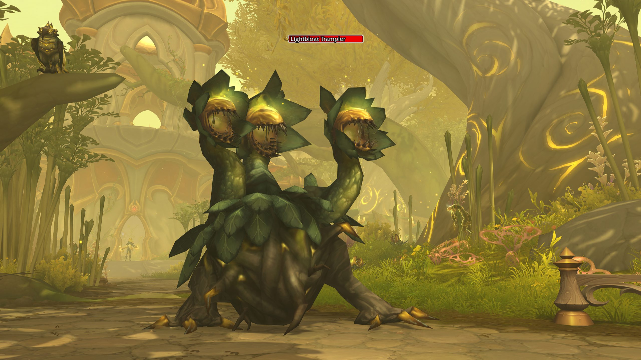A promotional screenshot of the World of Warcraft: Midnight alpha. A three-headed plant beast stands in a yellowish grove.