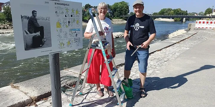 Comic-Ausstellung „Menschen am Fluss“ unter freiem Himmel