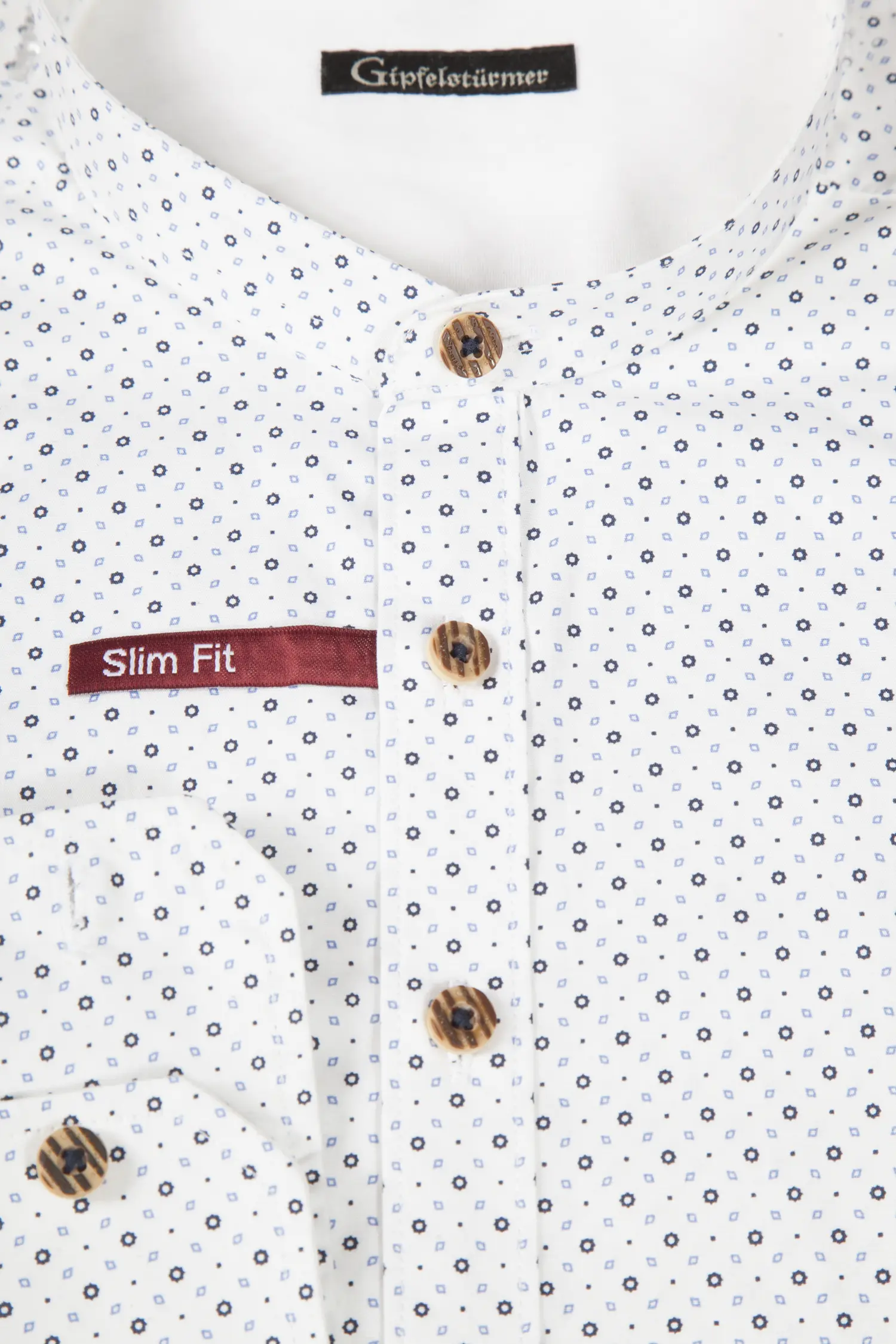 Trachtenhemd in weiß mit Muster in dunkelblau/hellblau - Detail Knöpfe