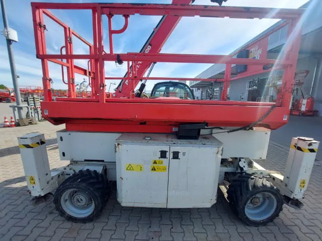 Genie GS-2669RT OR 2015 - Schaarhoogwerker afbeelding 1