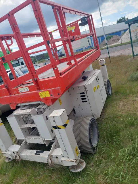 Genie GS-2669RT OR 2016 - Schaarhoogwerker afbeelding 1