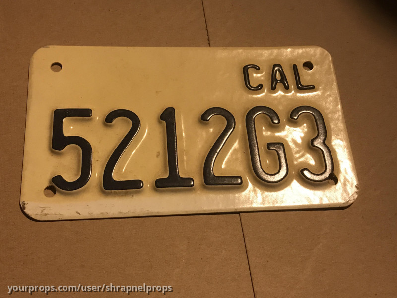 Motorcycle plate – Charmed (1998) – image 1