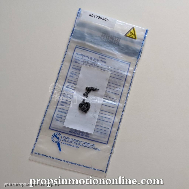 Heart locket in evidence bag – A Touch of Frost (1992) – image 1