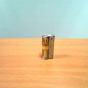 Marion's lighter prop replica – Raiders of the Lost Ark (1981)