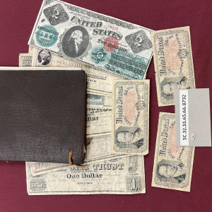 "Johnny's" (Henry Thomas) screenused prop Leather record book and Currency – Gangs of New York (2002)