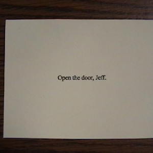 "Open the Door, Jeff" card that Jeff found in Jigsaw's Lair – Saw III (2006)