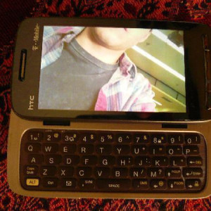 Rami Malek's T-Mobile HTC Touch Pro2 Cell Phone Used In Larry Crowne. – Larry Crowne (2011)