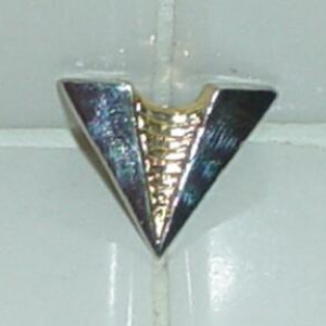 ensign rank pin. – Star Trek II: The Wrath of Khan (1982)