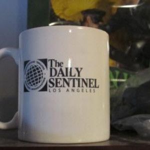 Daily Sentinel Coffee Mug from James Reid's Desk – The Green Hornet (2011)