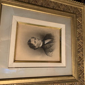 Gold framed charcoal portrait of man from Aunt March’s home. – Little Women (2019)