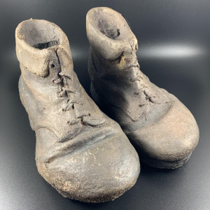 Pair of hanging boots – Gretel and Hansel: A New Musical (2020)