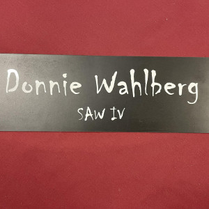 Donnie Wahlberg’s (“Eric”) Director Chair Plate – Saw IV (2007)