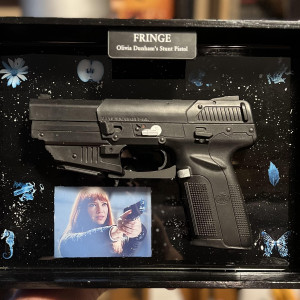 Futuristic side arm from parallel universe – Fringe (2008)